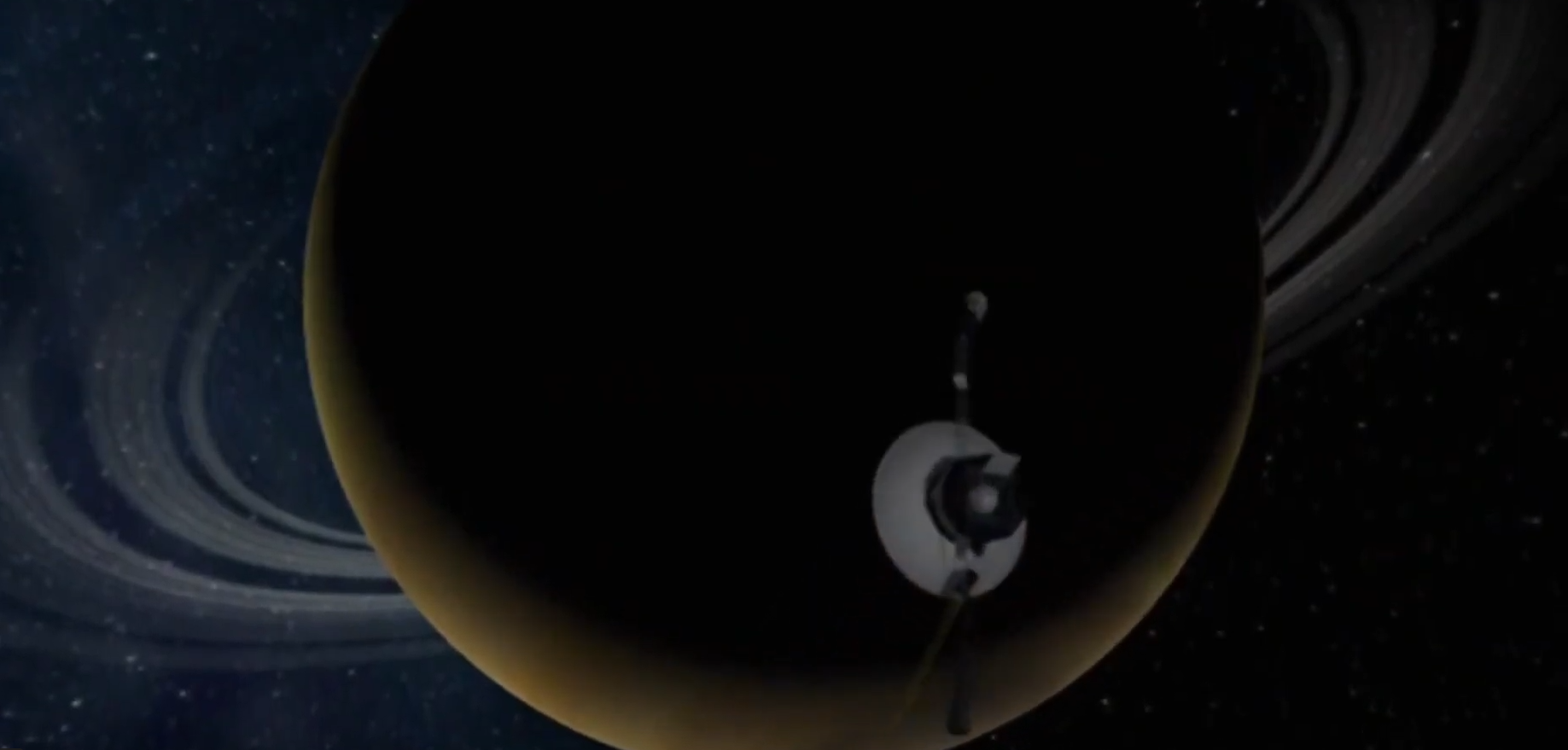 Image of the Voyager 2 spacecraft passing Saturn